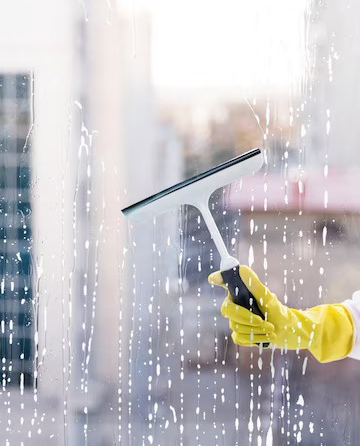 man-cleaning-window Cleaning Window